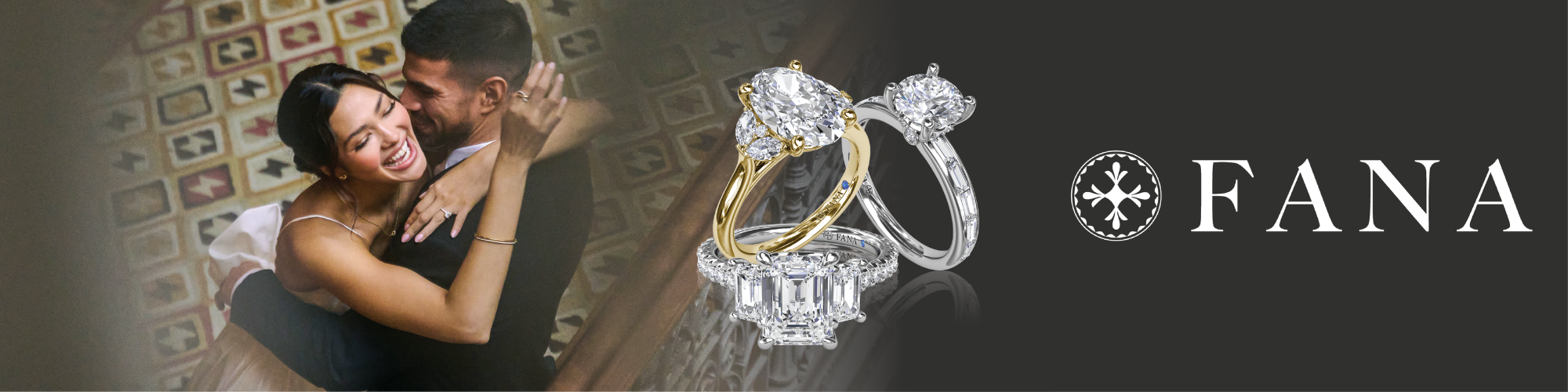 A romantic image of a joyful couple embracing on a staircase, with the woman in a white wedding dress and the man in a dark suit. To the right, the Fana jewelry brand logo is displayed above three luxurious diamond engagement rings—one with a yellow gold band and oval diamond, one with a white gold band and round diamond, and one with a platinum band and emerald-cut diamond surrounded by smaller stones. The background features an ornate tiled floor and a wrought-iron banister.